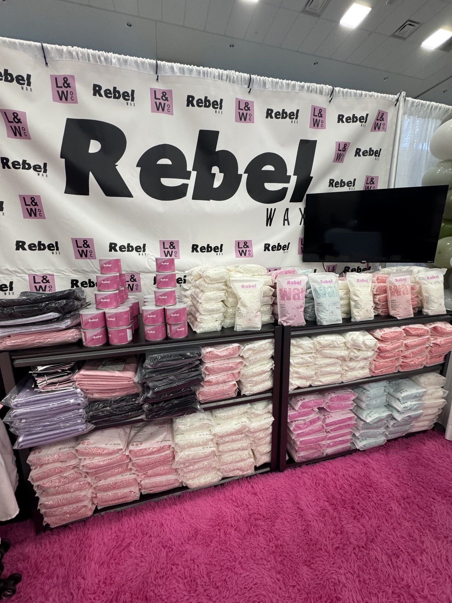 Rebel Wax event display with products